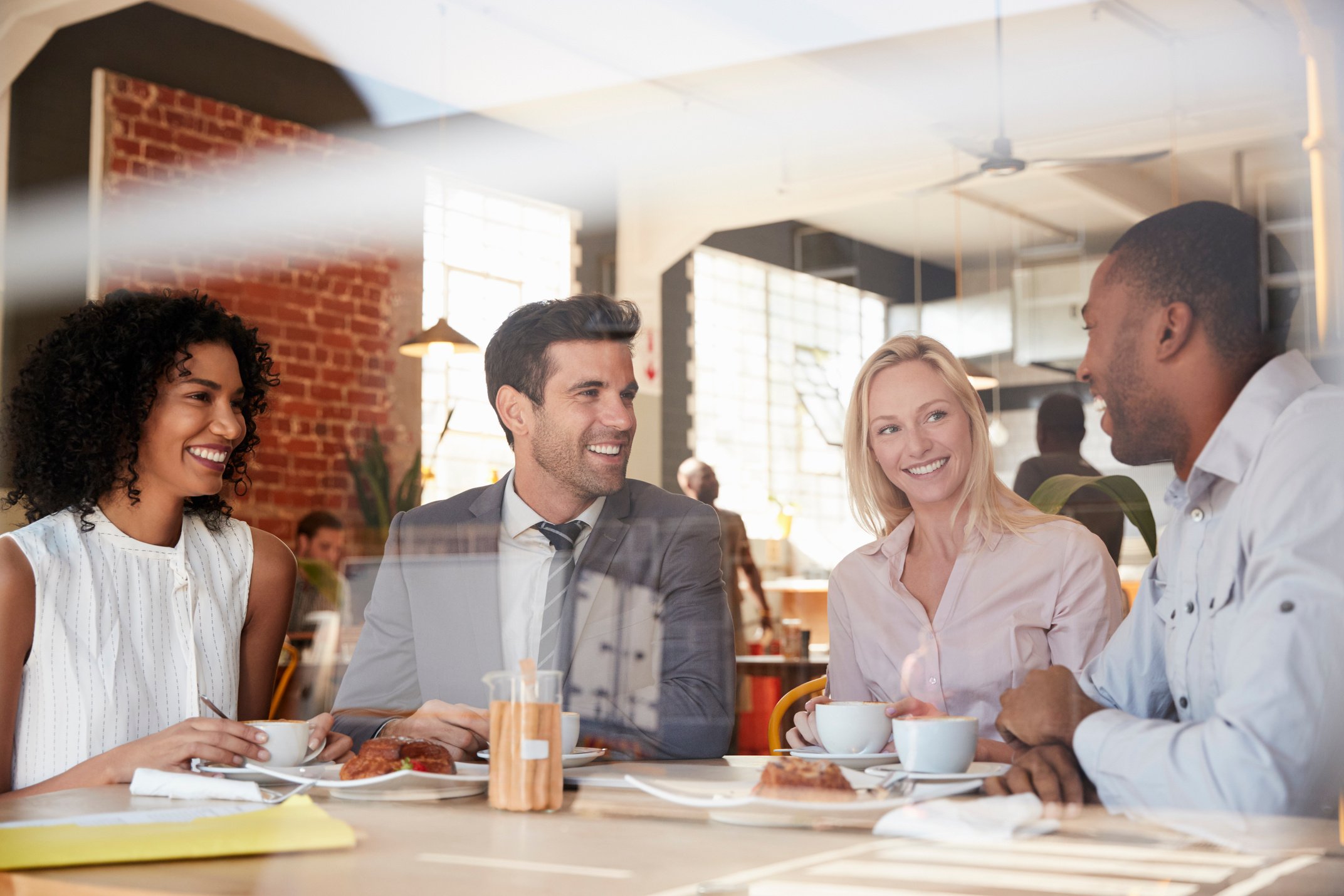 Businesspeople Meeting in Coffee Shop